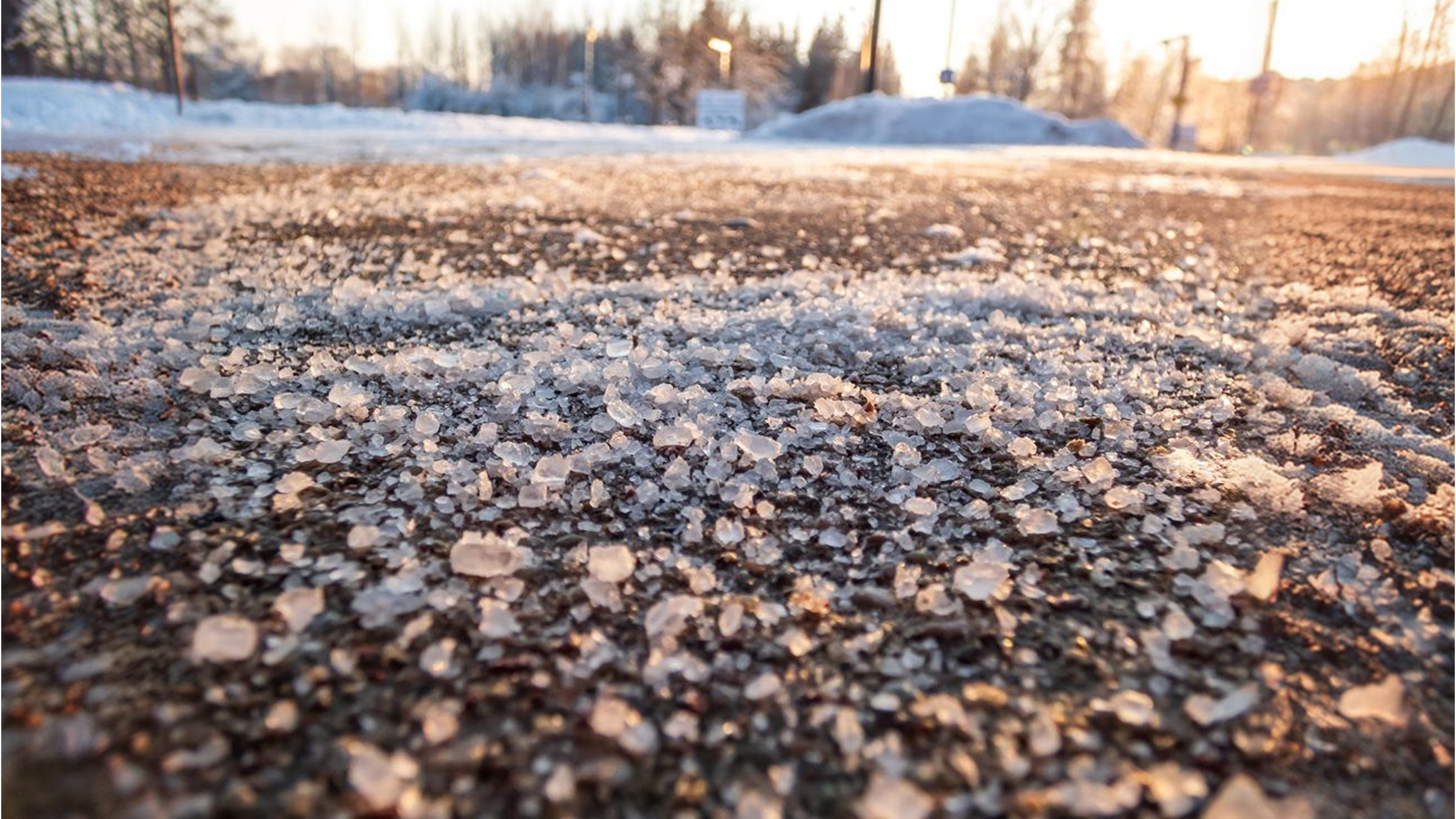 Image of salt and snow on asphalt