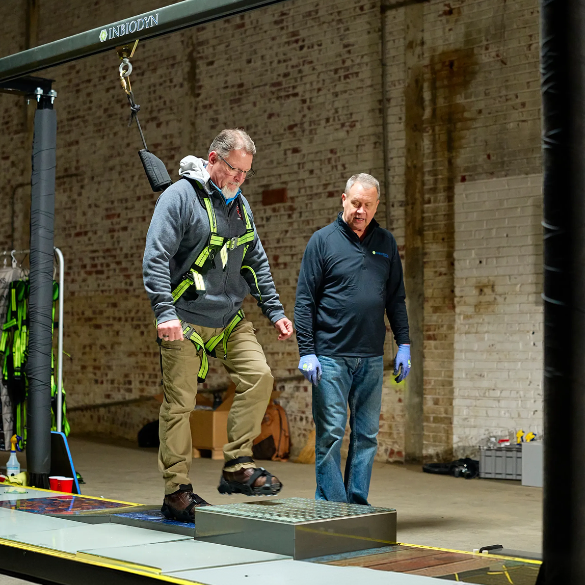 Man on Slip Simulator steps up on to higher surface