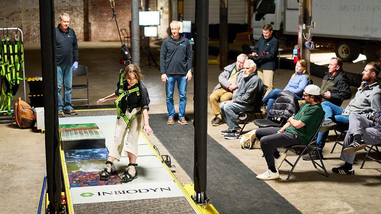 Class observing woman on Slip Simulator
